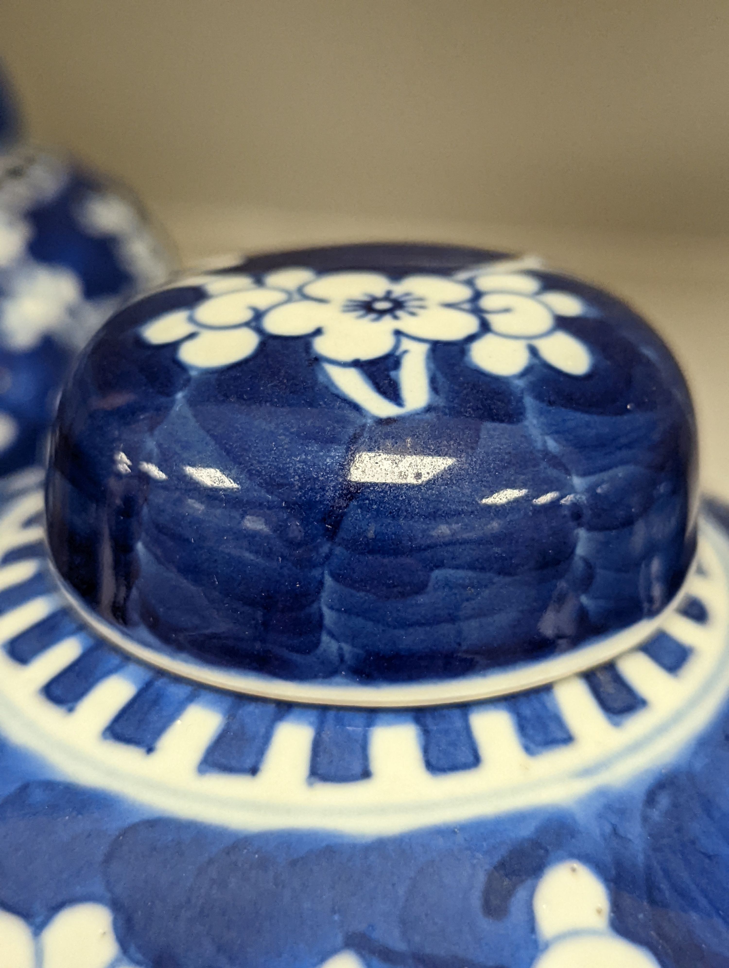 Three 19th century graduated Chinese blue and white ginger jars and covers